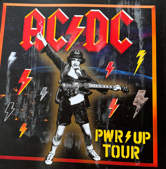 SoloDallas Celebrates Mention in AC/DC’s PWR UP Tour Book